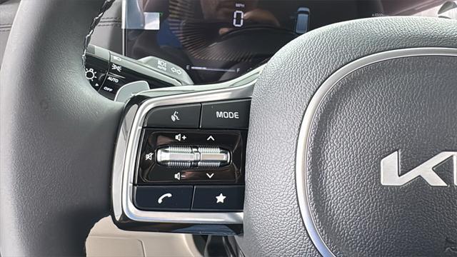 Photo of 2026 Snow White Pearl Kia Carnival Hybrid