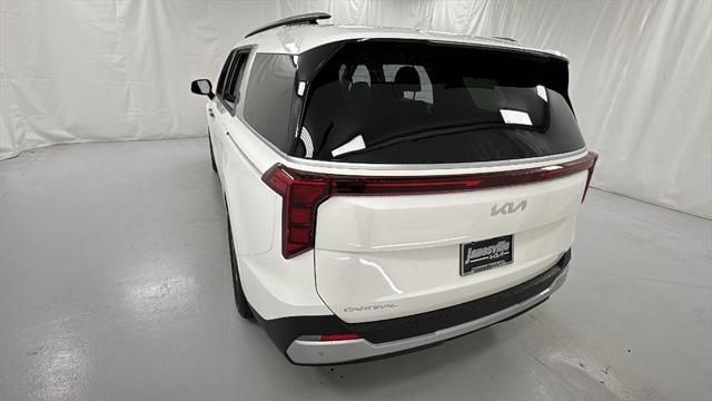 Photo of 2026 Snow White Pearl Kia Carnival Hybrid