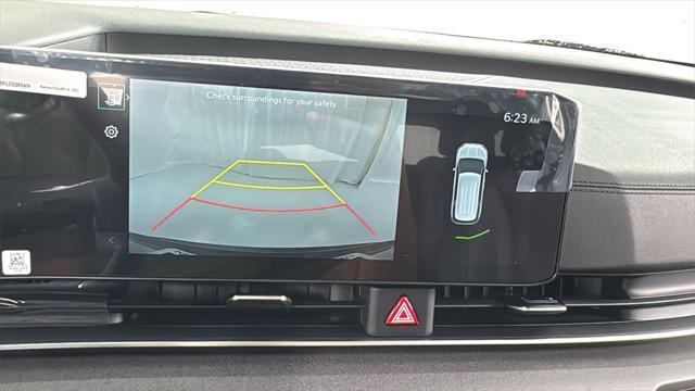 Photo of 2026 Deep Chroma Blue Kia Carnival Hybrid