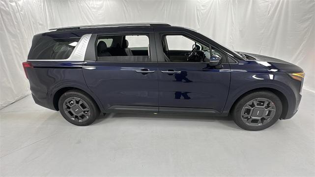Photo of 2026 Deep Chroma Blue Kia Carnival Hybrid