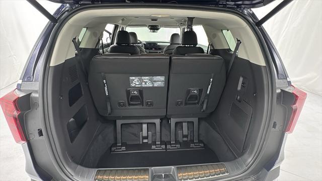 Photo of 2026 Deep Chroma Blue Kia Carnival Hybrid