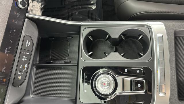Photo of 2026 Deep Chroma Blue Kia Carnival Hybrid