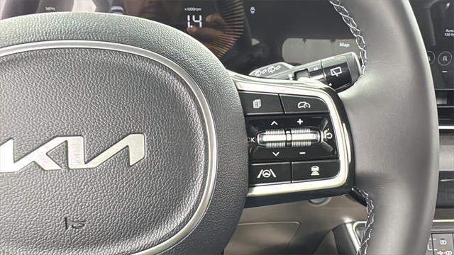 Photo of 2026 Deep Chroma Blue Kia Carnival Hybrid