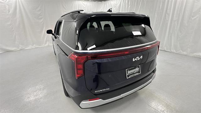 Photo of 2026 Deep Chroma Blue Kia Carnival Hybrid