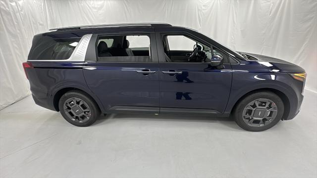 Photo of 2026 Deep Chroma Blue Kia Carnival Hybrid