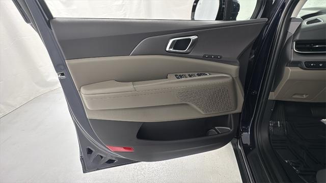 Photo of 2026 Deep Chroma Blue Kia Carnival Hybrid