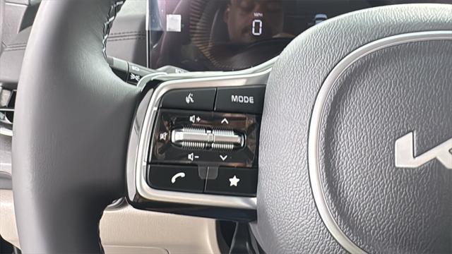 Photo of 2026 Deep Chroma Blue Kia Carnival Hybrid