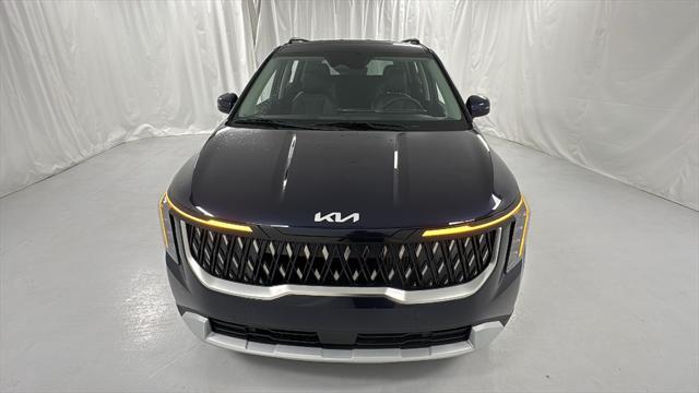 Photo of 2026 Deep Chroma Blue Kia Carnival Hybrid