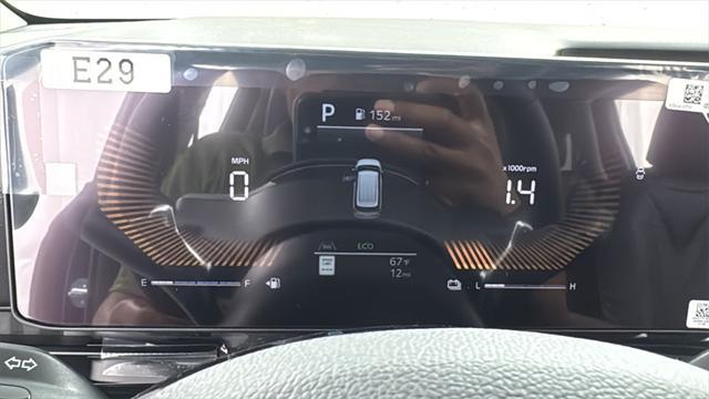 Photo of 2026 Deep Chroma Blue Kia Carnival Hybrid