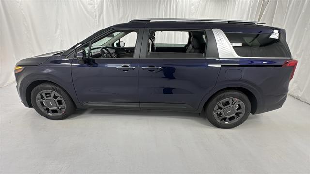 Photo of 2026 Deep Chroma Blue Kia Carnival Hybrid