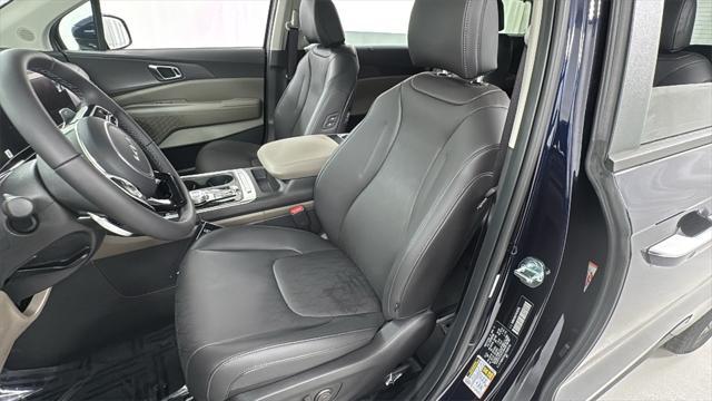 Photo of 2026 Deep Chroma Blue Kia Carnival Hybrid