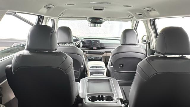 Photo of 2026 Deep Chroma Blue Kia Carnival Hybrid