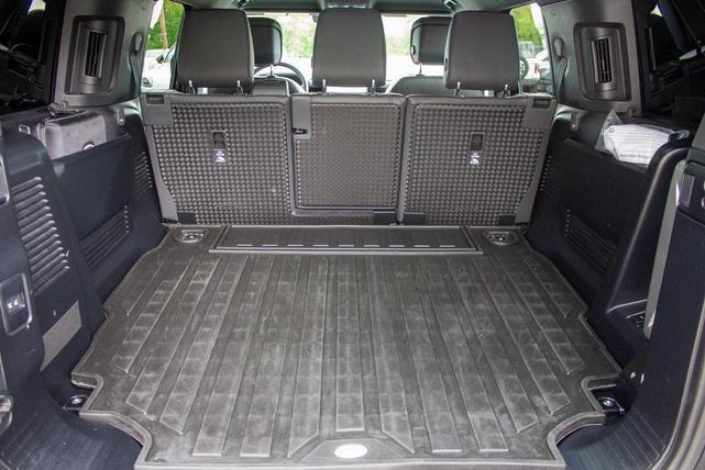 Photo of 2024 Santorini Black Metallic Land Rover Defender