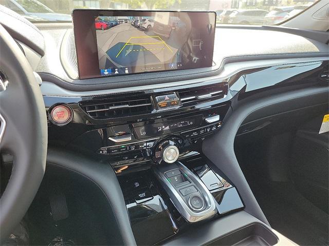 Photo of 2025 Liquid Carbon Metallic Acura MDX