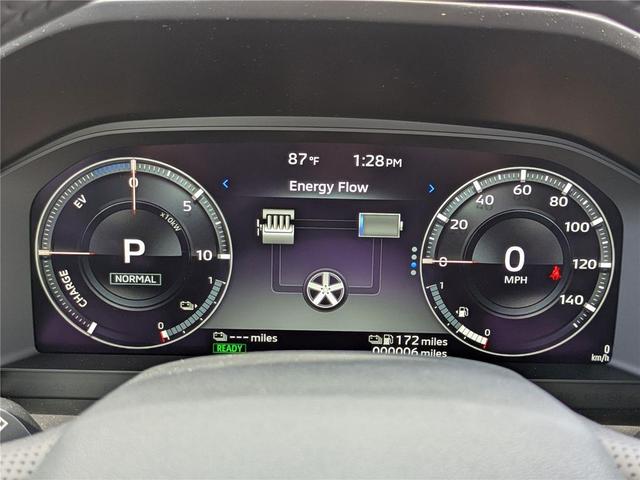 Photo of 2025 White Diamond Mitsubishi Outlander PHEV