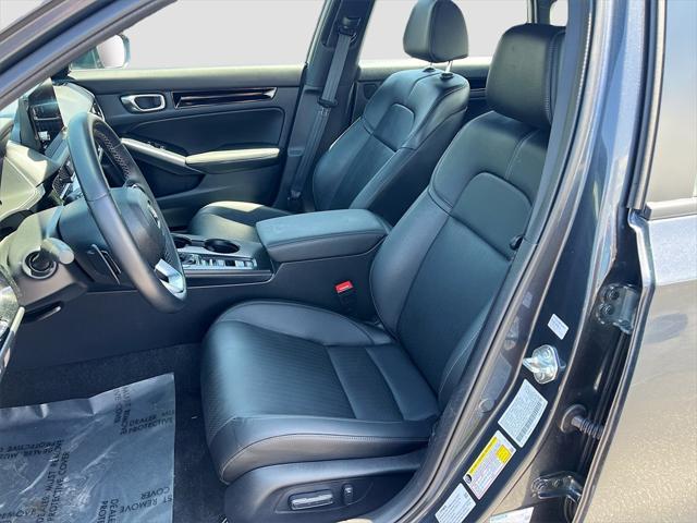 Photo of 2025 Solar Silver Metallic Honda Civic Hybrid