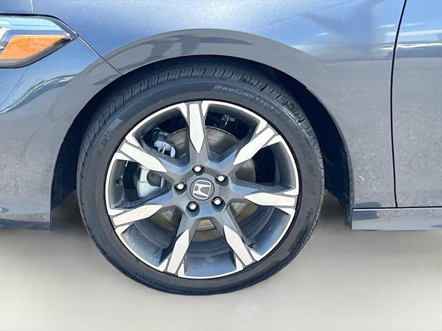 Photo of 2025 Solar Silver Metallic Honda Civic Hybrid