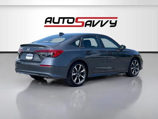 Photo of 2025 Solar Silver Metallic Honda Civic Hybrid