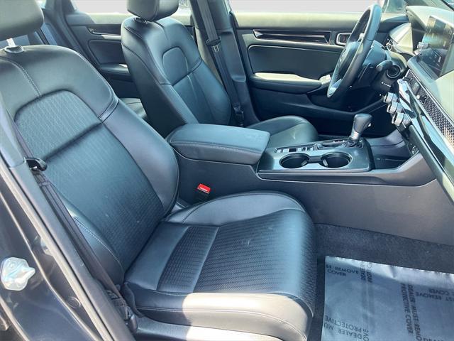Photo of 2025 Solar Silver Metallic Honda Civic Hybrid