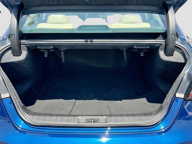 Photo of 2023 Deep Blue Pearl Nissan Maxima