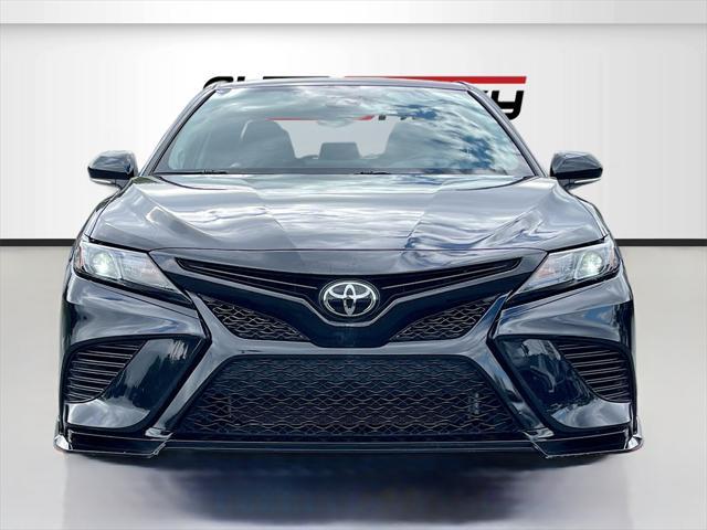 Photo of 2023 Midnight Black Metallic Toyota Camry