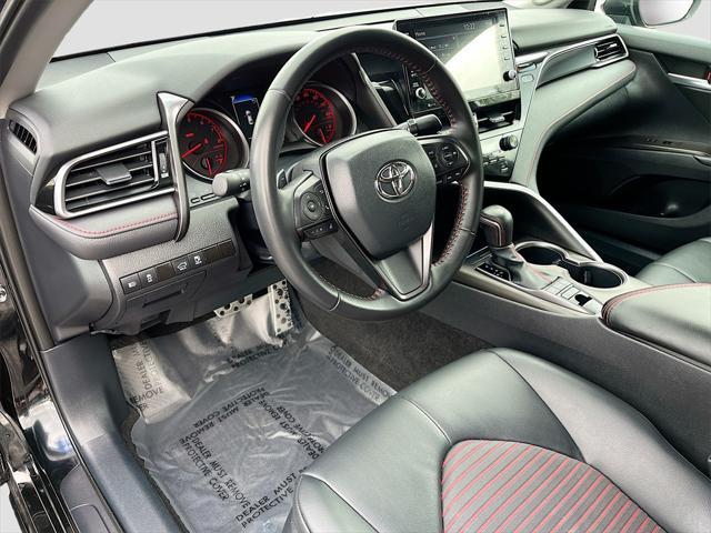 Photo of 2023 Midnight Black Metallic Toyota Camry