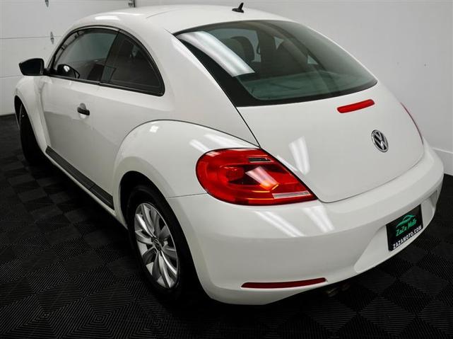 Photo of 2014 Candy White Volkswagen Beetle