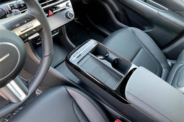 Photo of 2025 Titan Gray Hyundai TUCSON Hybrid
