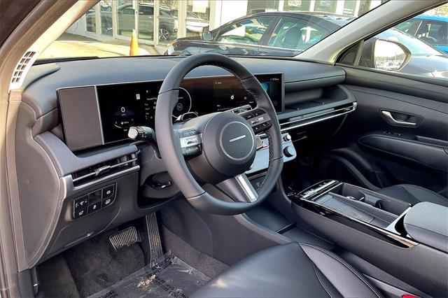 Photo of 2025 Titan Gray Hyundai TUCSON Hybrid