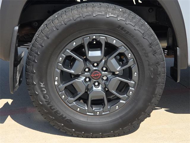 Photo of 2024 Boulder Gray Pearl Nissan Frontier