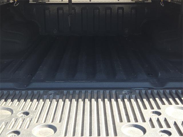 Photo of 2024 Boulder Gray Pearl Nissan Frontier