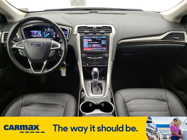 Photo of 2014 White Ford Fusion Energi