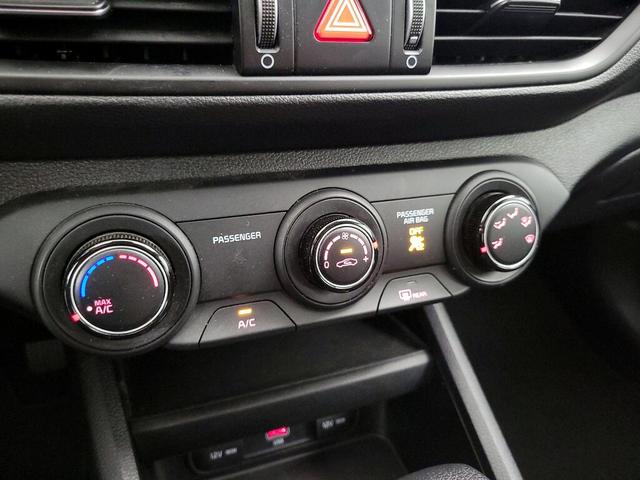 Photo of 2023 Orange Kia Forte