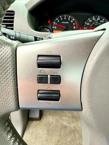 Photo of 2011 Radiant Silver Nissan Frontier