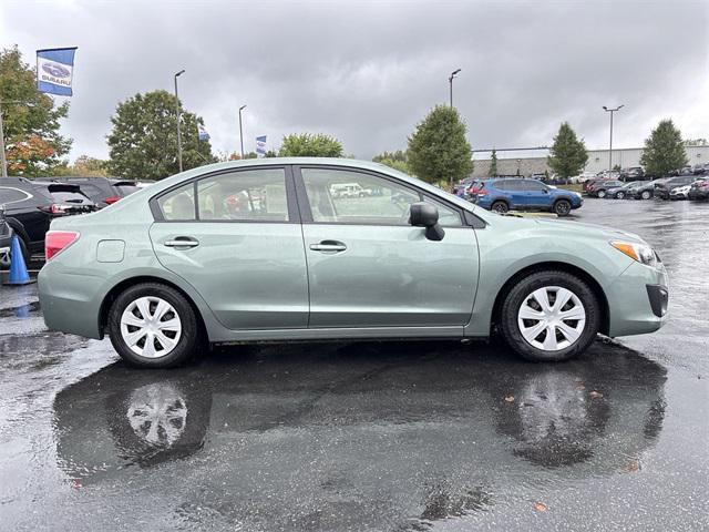 Photo of 2014 Jasmine Green Metallic Subaru Impreza
