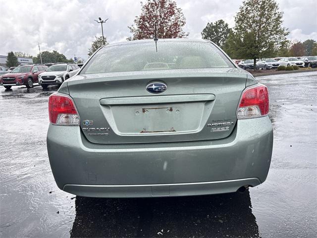 Photo of 2014 Jasmine Green Metallic Subaru Impreza