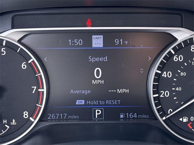 Photo of 2023 Pearl White Tricoat Nissan Altima