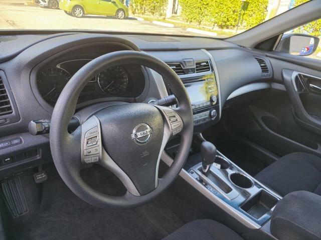 Photo of 2014 Brilliant Silver Metallic Nissan Altima