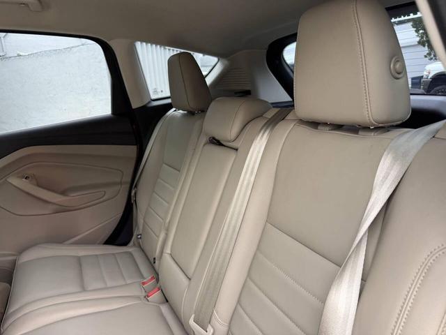 Photo of 2015 Ruby Red Metallic Tinted Clearcoat Ford C-Max Hybrid