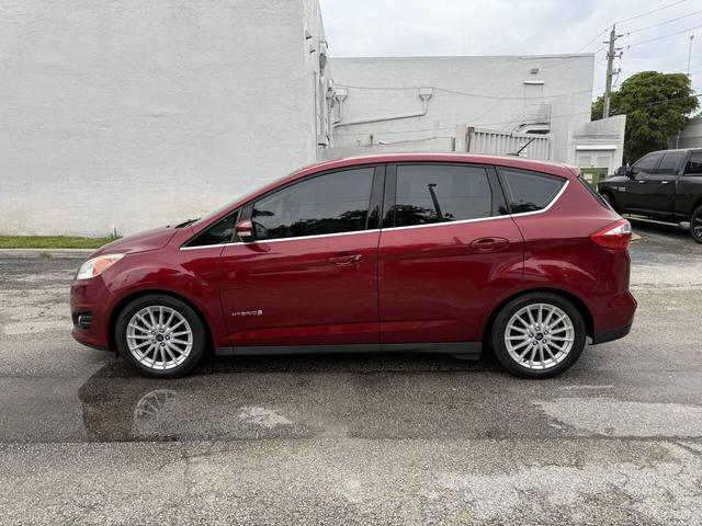 Photo of 2015 Ruby Red Metallic Tinted Clearcoat Ford C-Max Hybrid