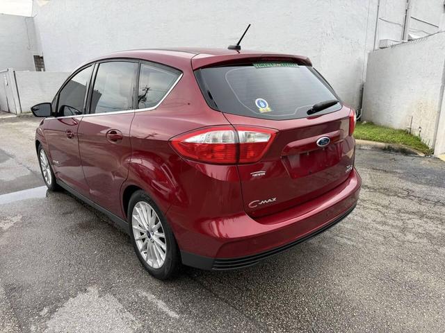 Photo of 2015 Ruby Red Metallic Tinted Clearcoat Ford C-Max Hybrid