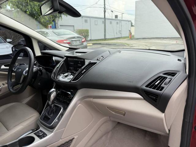 Photo of 2015 Ruby Red Metallic Tinted Clearcoat Ford C-Max Hybrid
