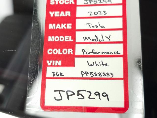 Photo of 2023 Pearl White Multi-Coat Tesla Model Y