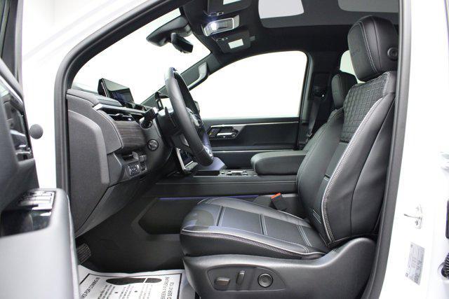 Photo of 2025 Summit White GMC Sierra EV