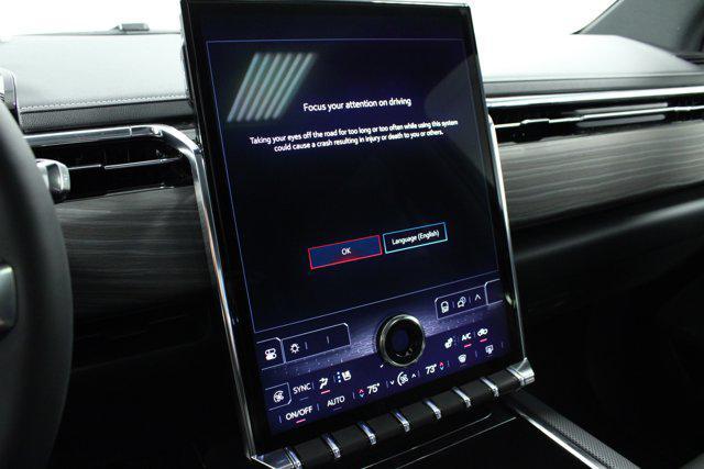 Photo of 2025 Summit White GMC Sierra EV