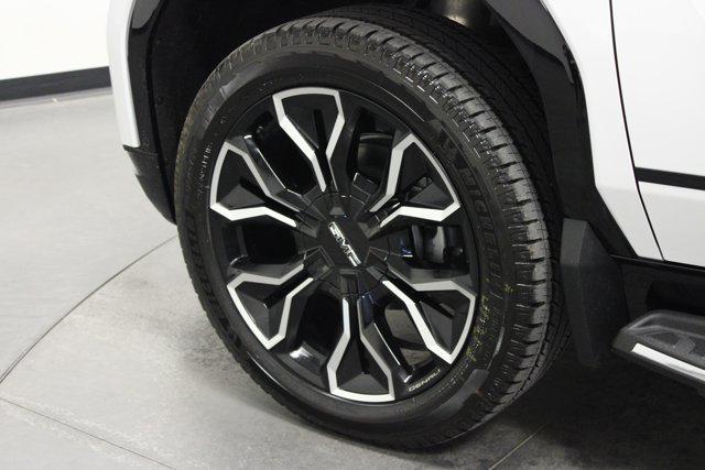 Photo of 2025 Summit White GMC Sierra EV