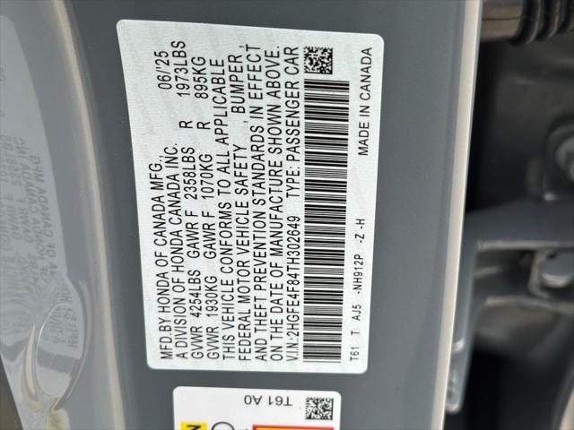 Photo of 2026 Crystal Black Pearl Honda Civic Hybrid