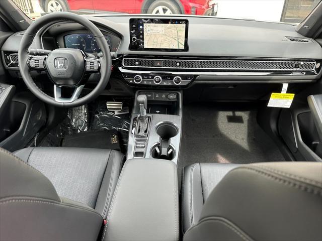 Photo of 2026 Crystal Black Pearl Honda Civic Hybrid