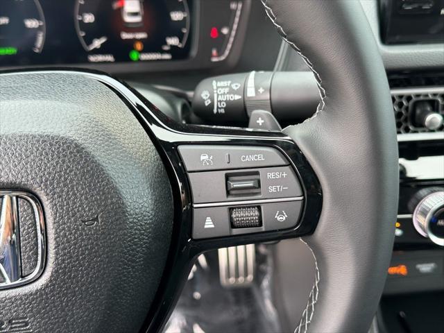 Photo of 2026 Crystal Black Pearl Honda Civic Hybrid