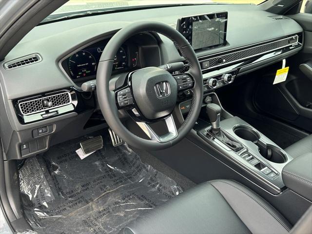 Photo of 2026 Crystal Black Pearl Honda Civic Hybrid